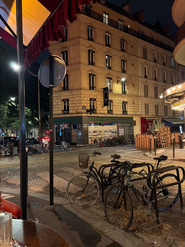 A rainy Paris night, moving between streets, cafés, and restaurants