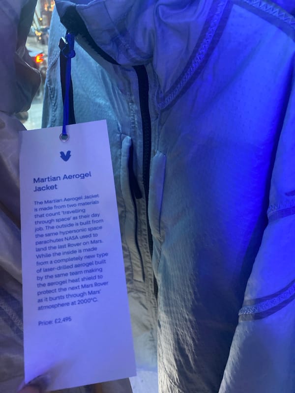 Space-themed exhibition with DJ performance documented in central London
