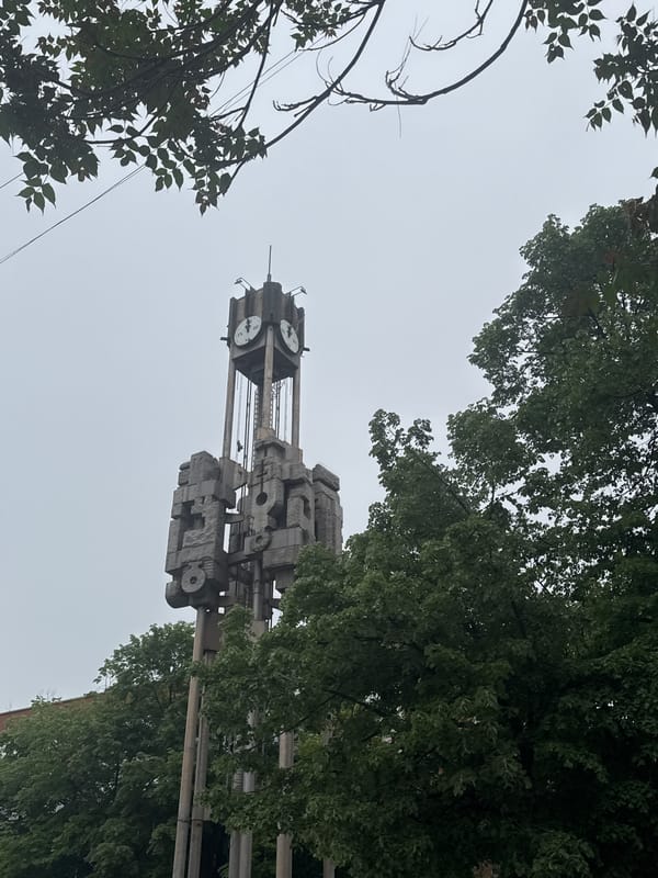 Tourist documents Haskovo landmarks including clock tower and sculpture