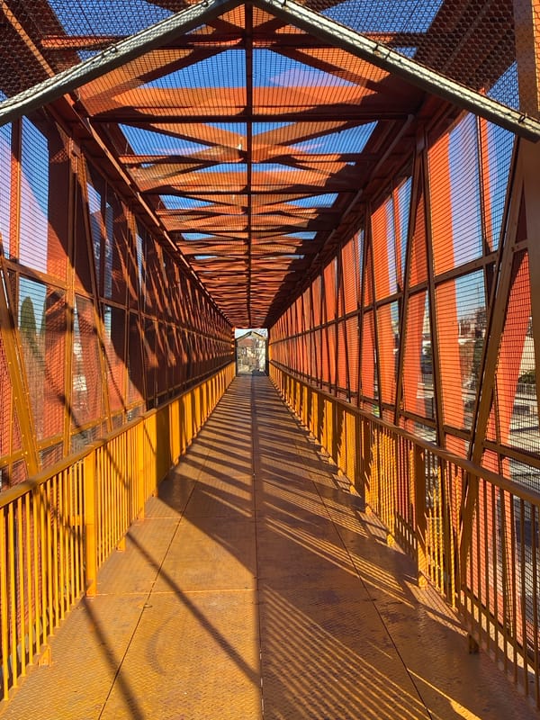 Orange elevated pedestrian walkway in Buenos Aires