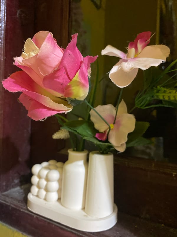 Quiet indoor moments captured in Tanjongkapai: flowers and drinks