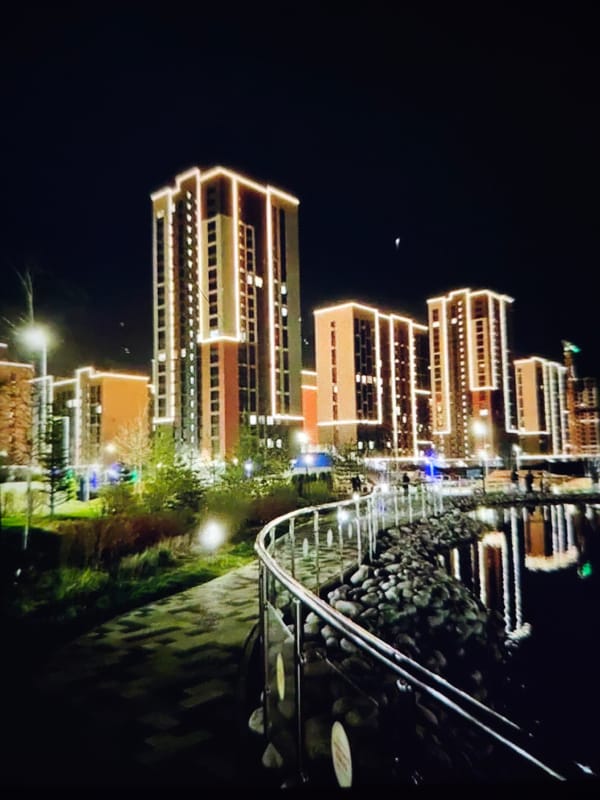 Stavropol at night: lit fountains and residential towers
