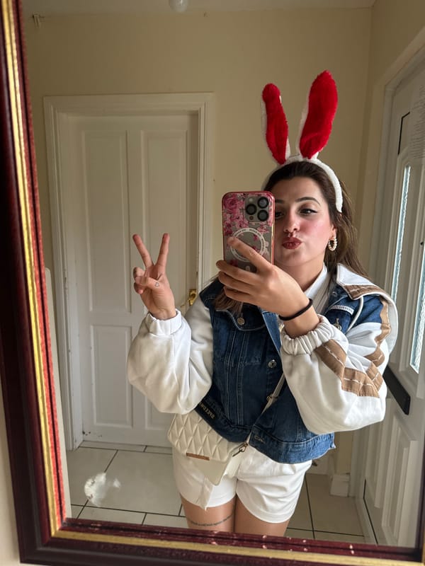 Person takes selfie with bunny ears in Armagh mirror