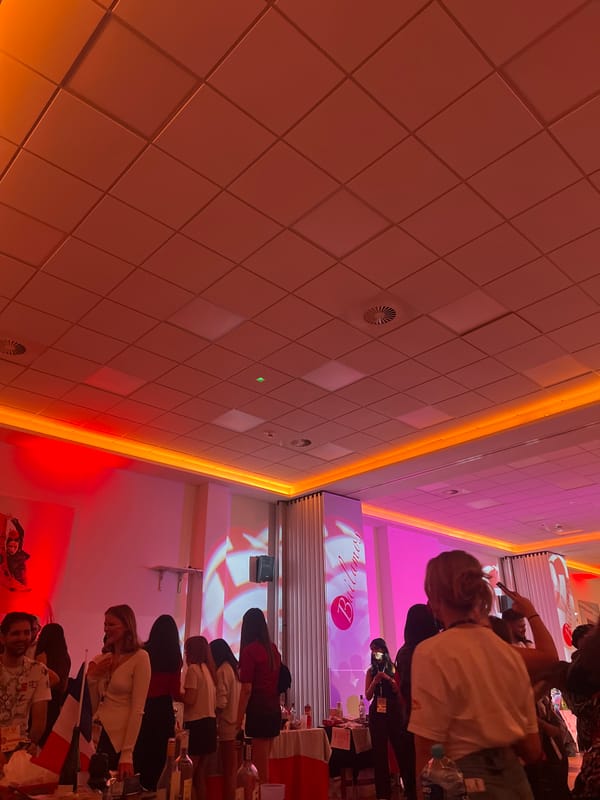 Indoor gathering documented in modern hall, Bydgoszcz, Poland