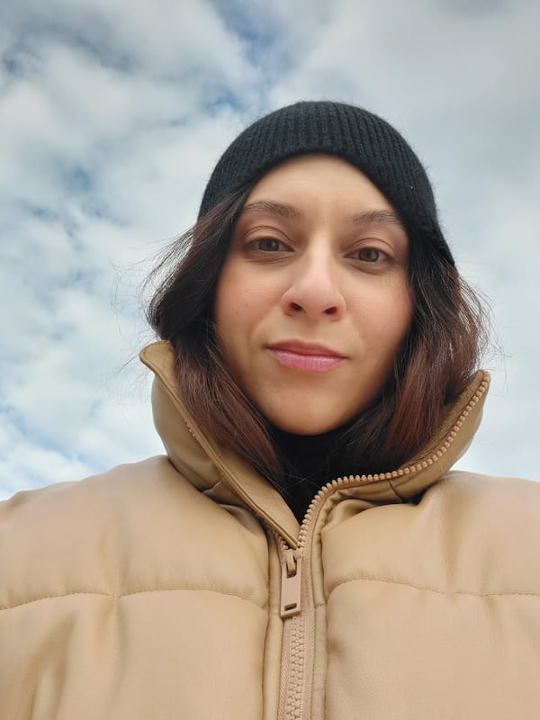 Woman photographed smiling in winter clothing in Novosibirsk