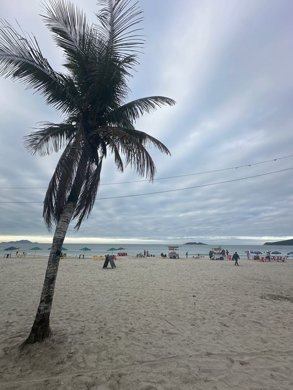 Quiet beach vendor scene on a cloudy day in Florianópolis