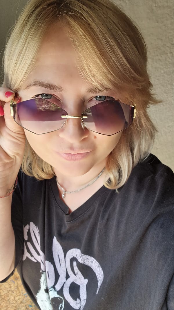 Summer afternoon selfies, wheat bundles, and Cyrillic cardboard