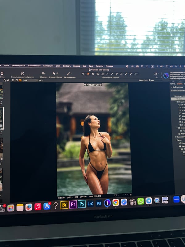Photographer edits bikini photos in Capture One software in Kazan