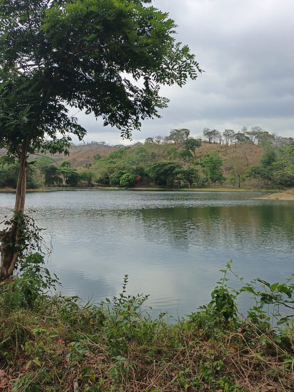 Motorcyclist visits peaceful Tamanaco dam in Tinaquillo, Venezuela