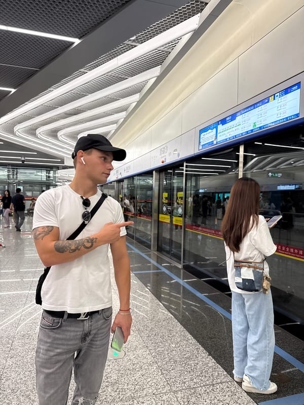 Man travels through Guangzhou metro station making gestures