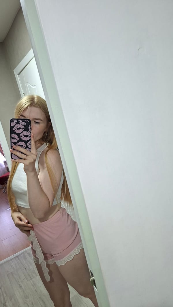 Mirror selfie session in a Chaikovsky bedroom