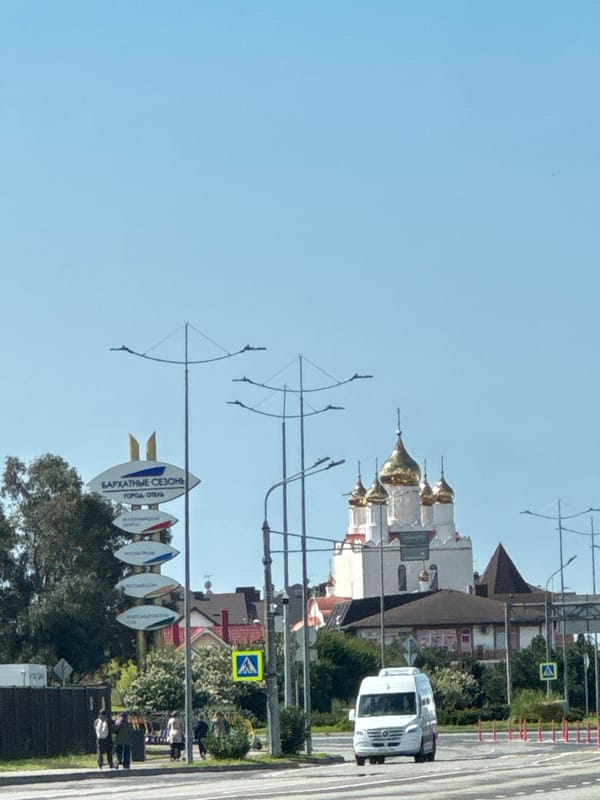 Morning street activity and landscaping work observed in Sirius, Russia