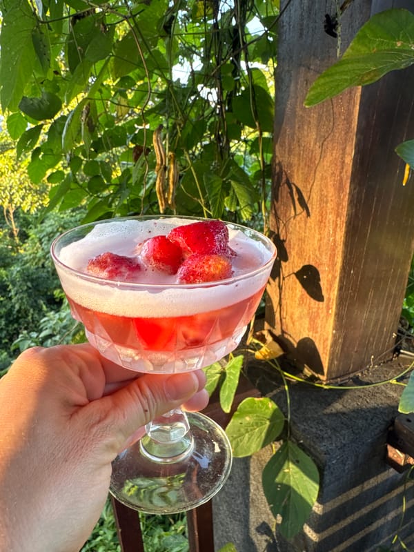 Remote worker enjoys cocktails during outdoor video meeting in Bali