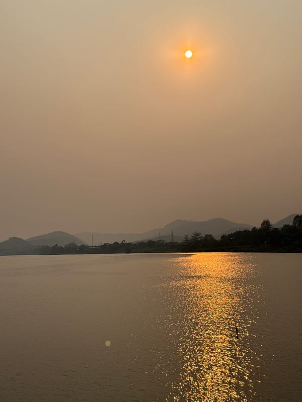 Sunset observed over water in Kim Long Ward, Vietnam