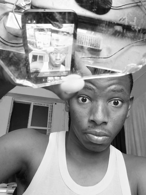 Young man records gestural video sequence in Lagos indoor setting