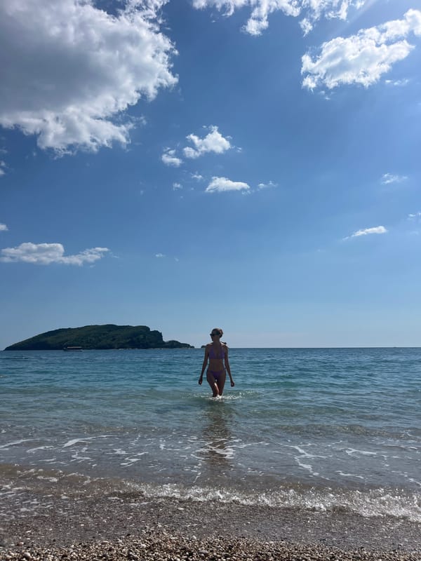 Woman enjoys beach time in Budva, Montenegro