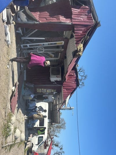 Damaged buildings and cleanup observed in Vysokyi, Ukraine