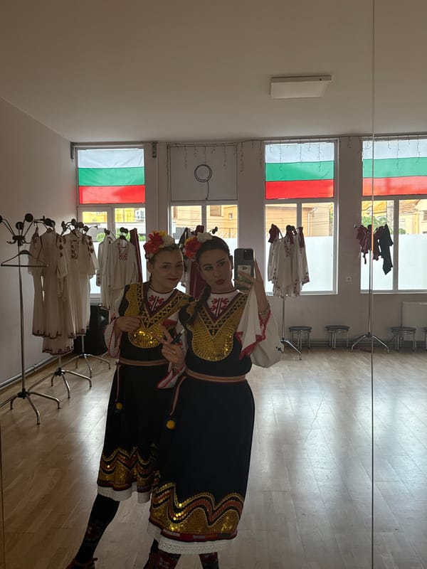 Women pose in Bulgarian folk costumes in Mezdra