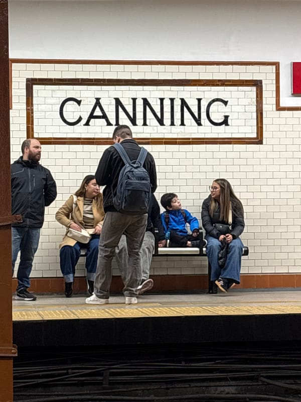 Evening commuters gather at Buenos Aires Canning subway station