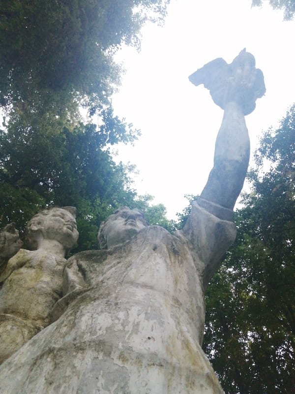 Stone lions, figurative sculptures, and lakeside scenes in Slonim