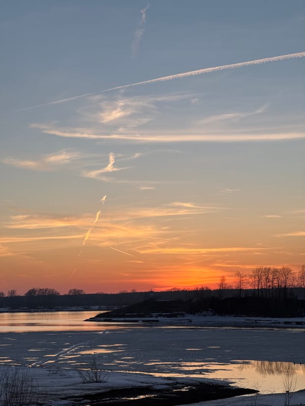 Sunset photography session documented along waterway in Chaikovsky, Russia
