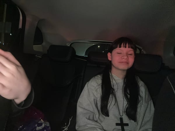 Night car journey through Moscow traffic captures passengers, landmarks