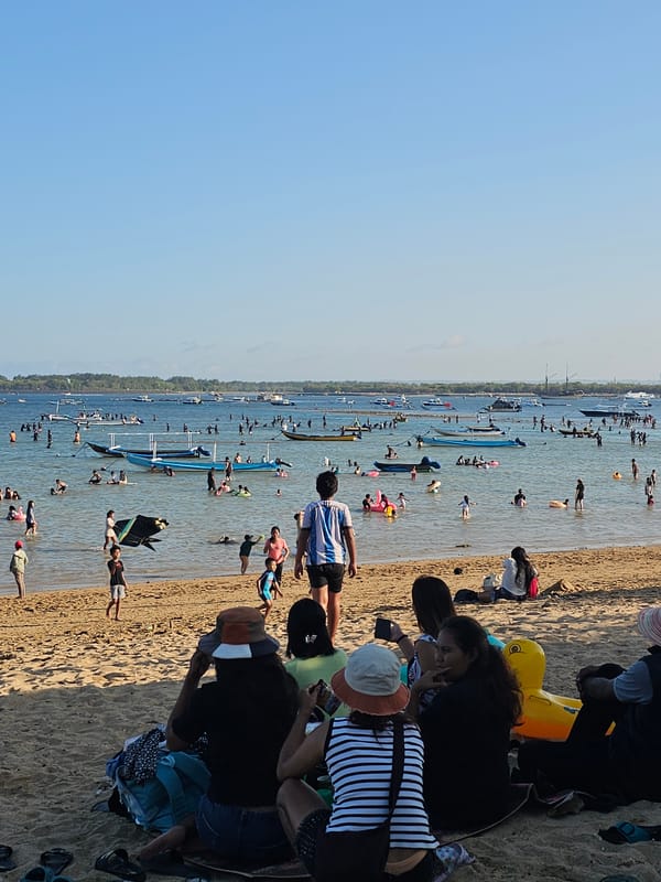 Kite festival and beach crowds fill Sanur on a busy Bali morning