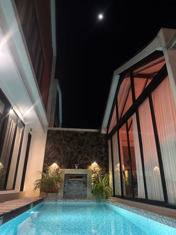 Woman photographed by illuminated pool in Kediri, Indonesia