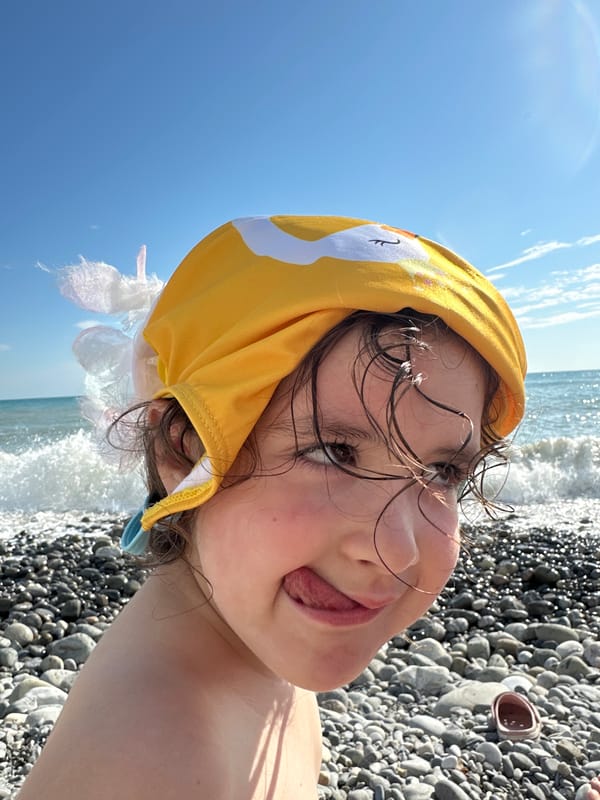 Sochi's Black Sea beach on a busy summer afternoon
