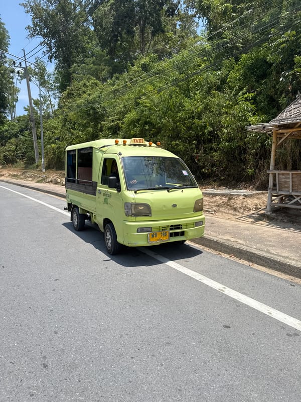 Morning scenes captured in Patong: taxi-bus, convenience store