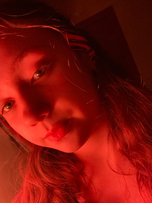 Young person photographed in various indoor poses and selfies