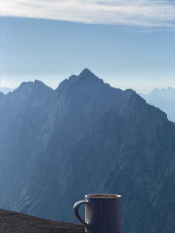 Morning coffee at a high-altitude cable car station in the Alps