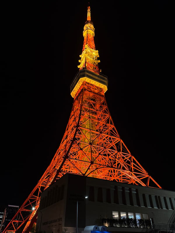Tokyo Tower photographed at night in iconic orange illumination