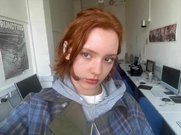 Young person photographed in Dundee office or classroom setting