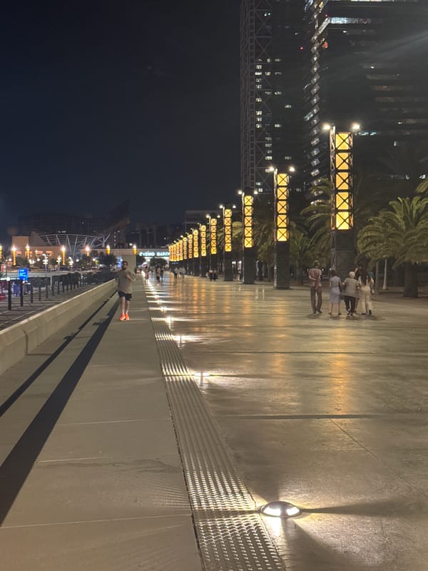 Night stroll along Barcelona's Port Olímpic marina promenade