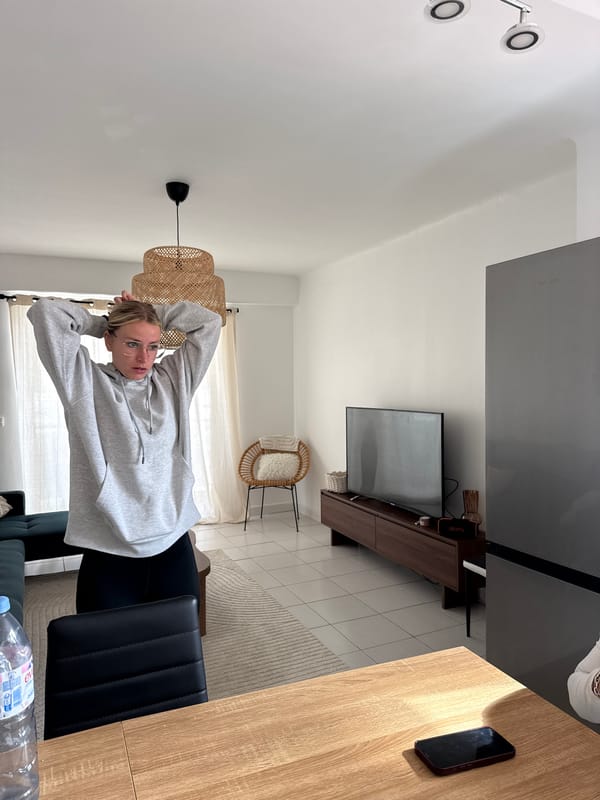 Woman relaxing in chair at Cannes residence