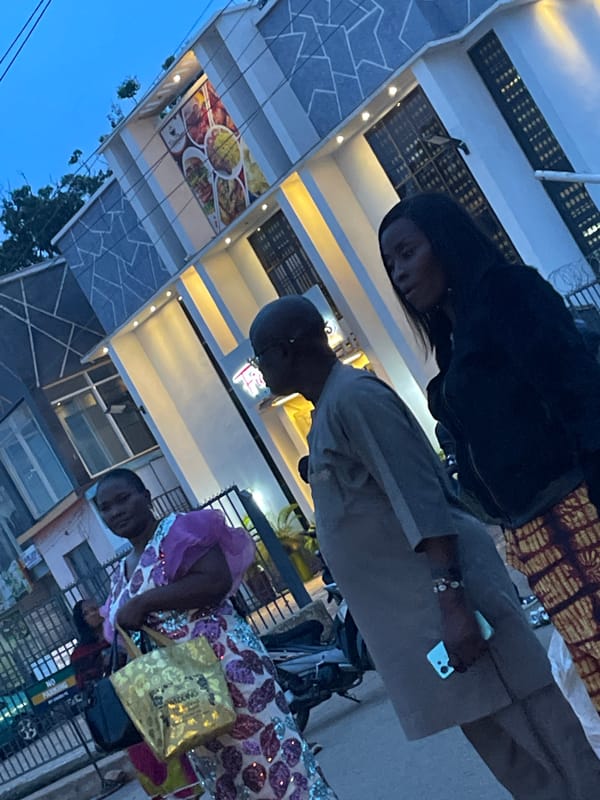 Evening street scenes and political billboards in Jos, Nigeria