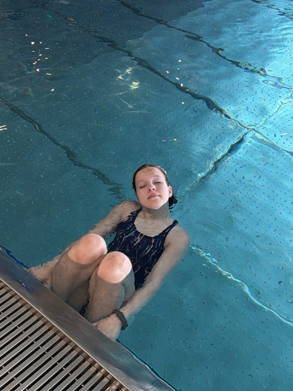 Woman enjoys early morning swim in Chaikovsky pool