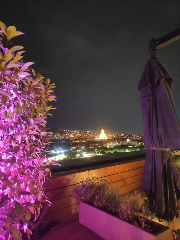 Tbilisi rooftop bar buzzing on a summer night