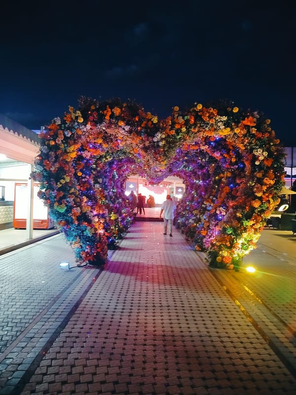 Lit-up decorative landmarks at night in Aksukent, Kazakhstan