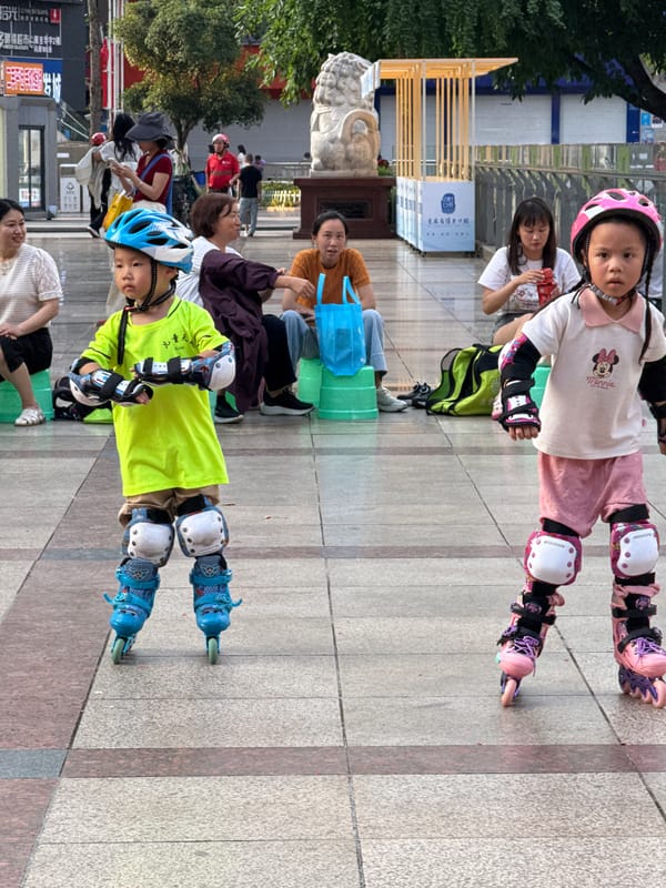 Children practice rollerblading in supervised outdoor session, Shapingba District