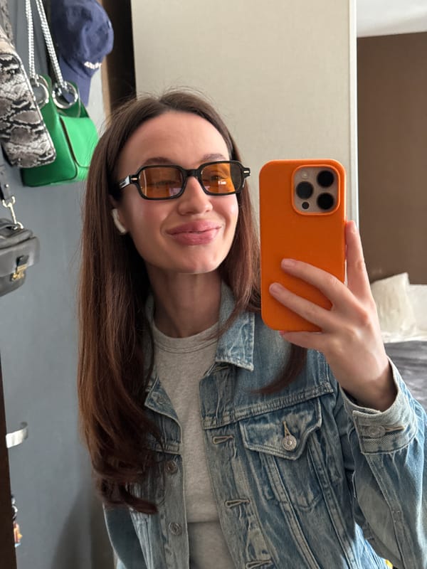 Woman takes multiple selfies across Tel Aviv locations