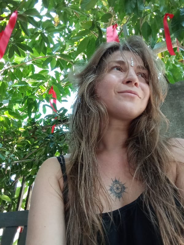 Woman observed among trees at Vietnamese heritage area