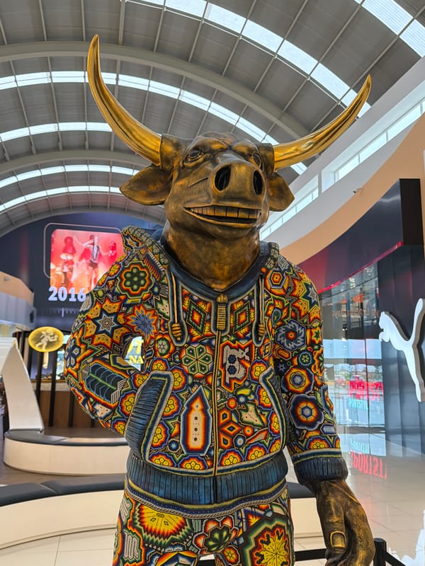 Decorative sculptures and animatronic dinosaurs displayed at Mexican mall