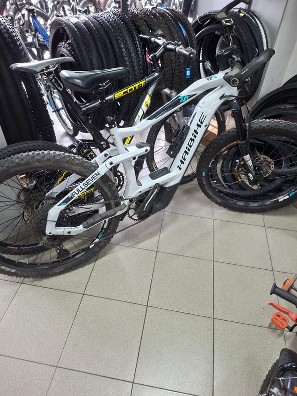 White electric bicycle spotted parked indoors in Gabrovo, Bulgaria
