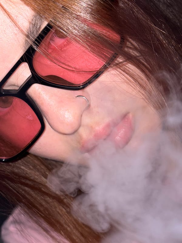 Person photographed with smoke effects in Krasnodar, Russia