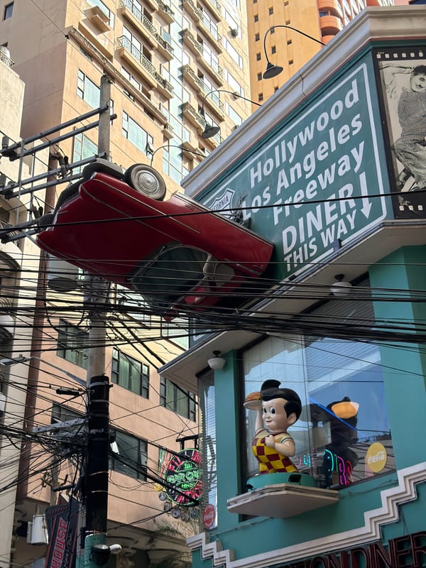 Morning street life documented in Makati commercial district