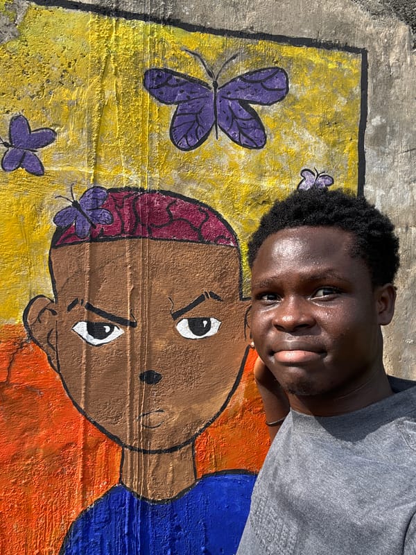Young man conducts informal photo session in Ihiagwa Nigeria