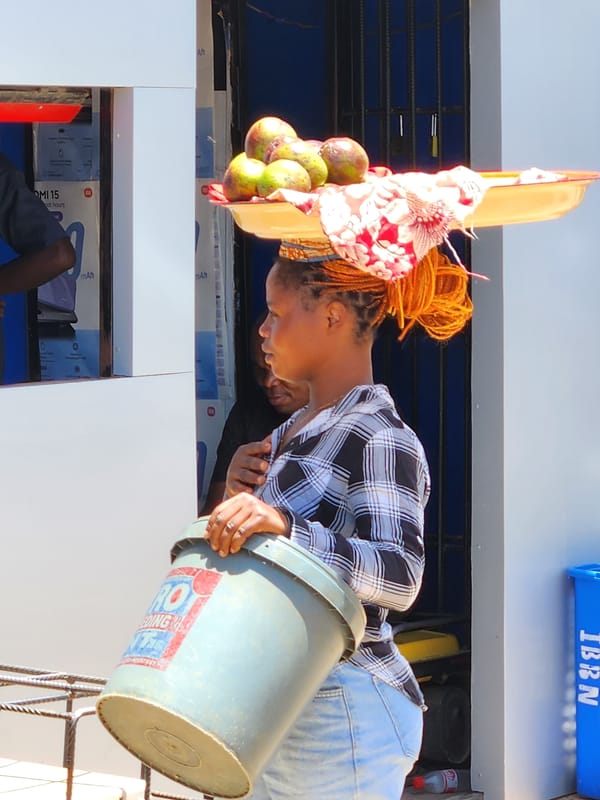 Daily life unfolds across Jos markets and streets