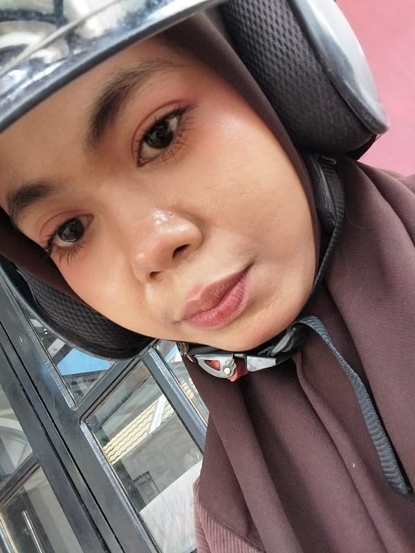 Helmet selfies snapped on a morning ride in Sulawesi